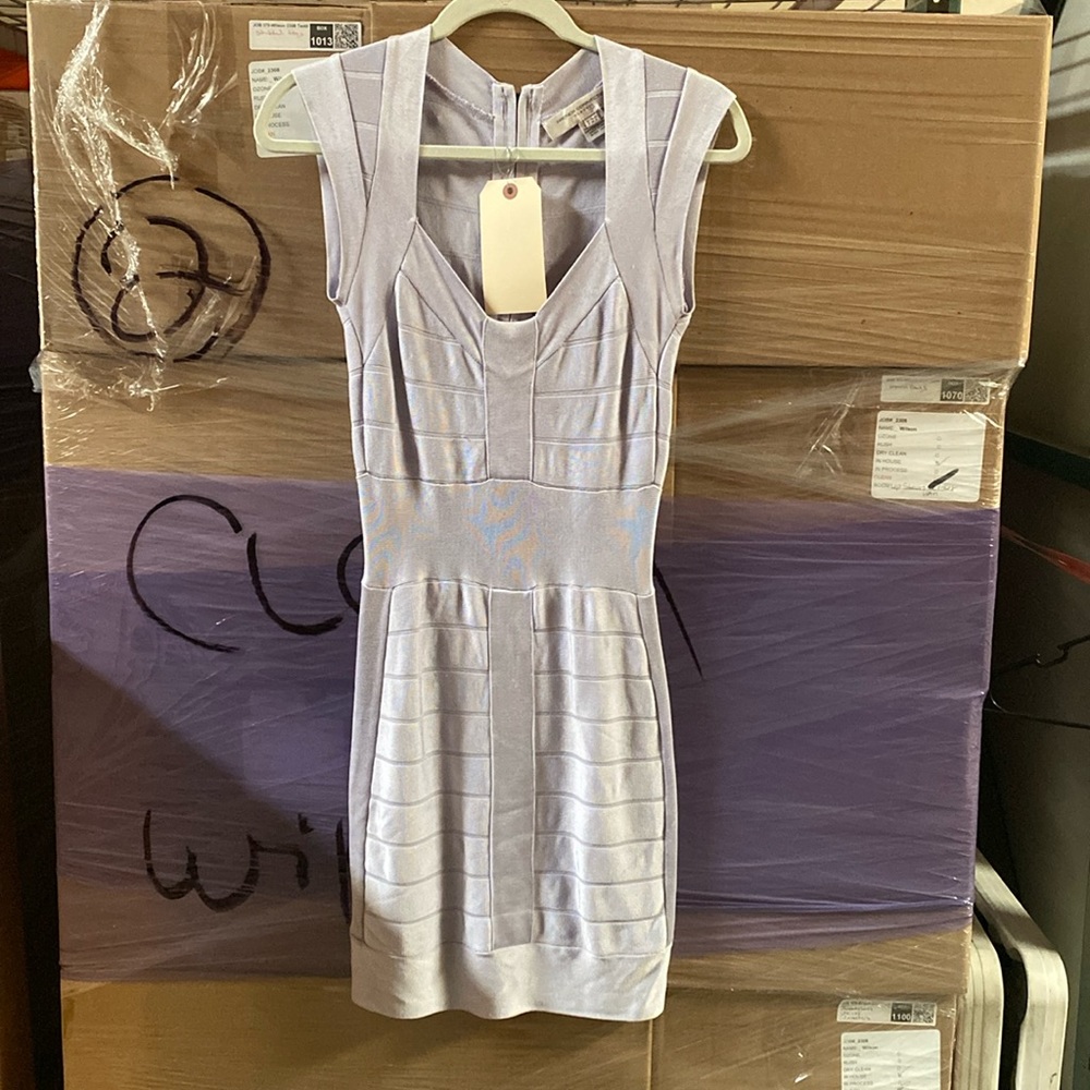 An elegant lilac fitted dress. Size 4